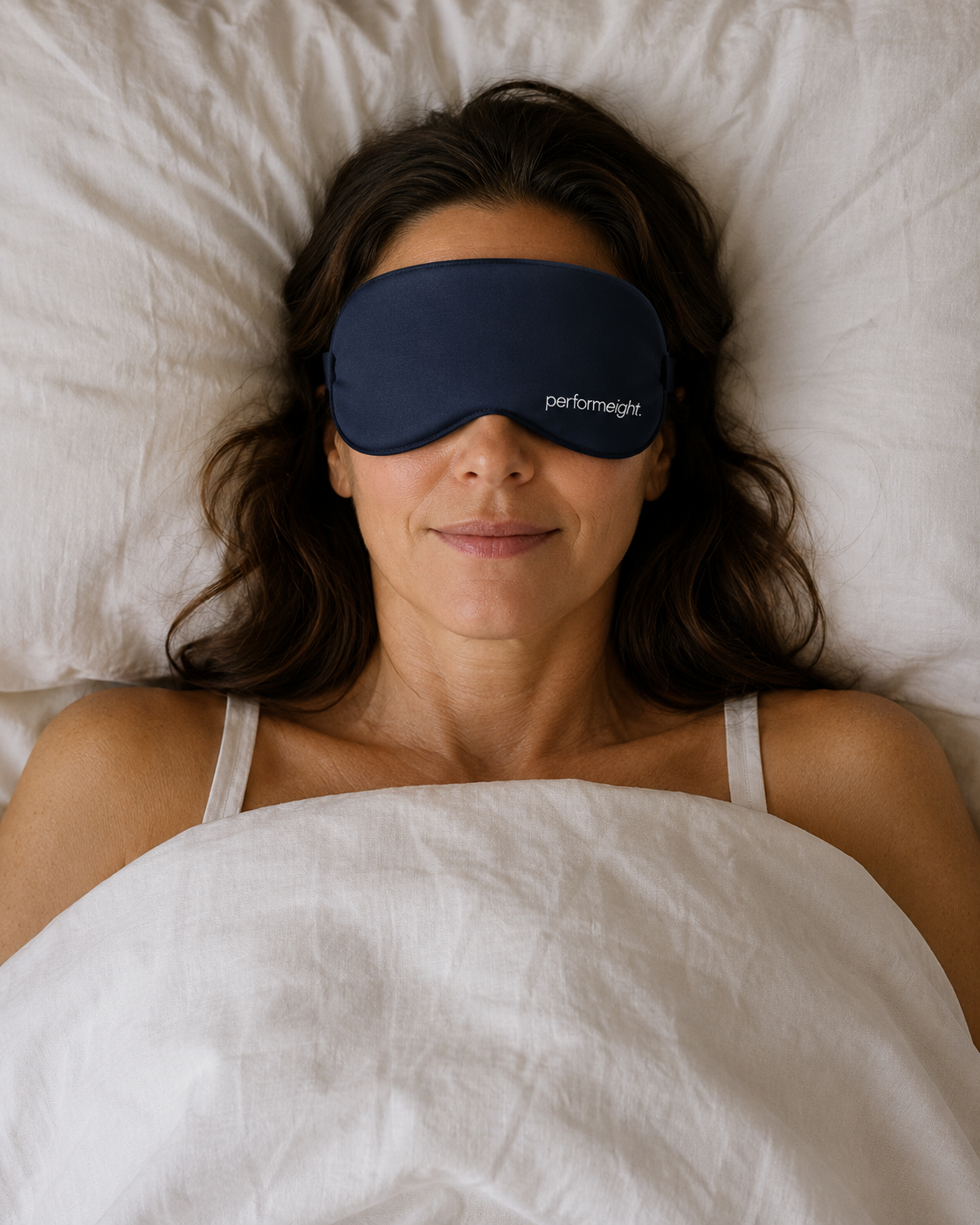 A person resting with a performeight sleep mask — clinical substance, calm outcome